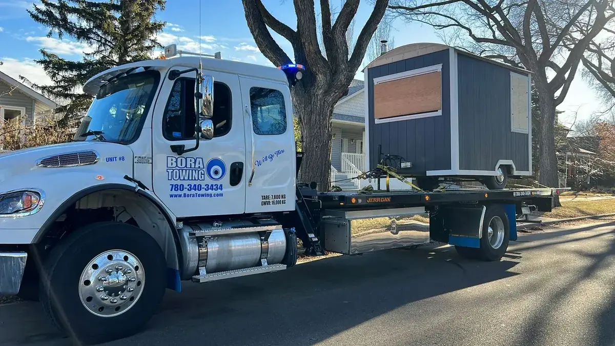 Bora Towing medium-duty tow truck on Edmonton roads